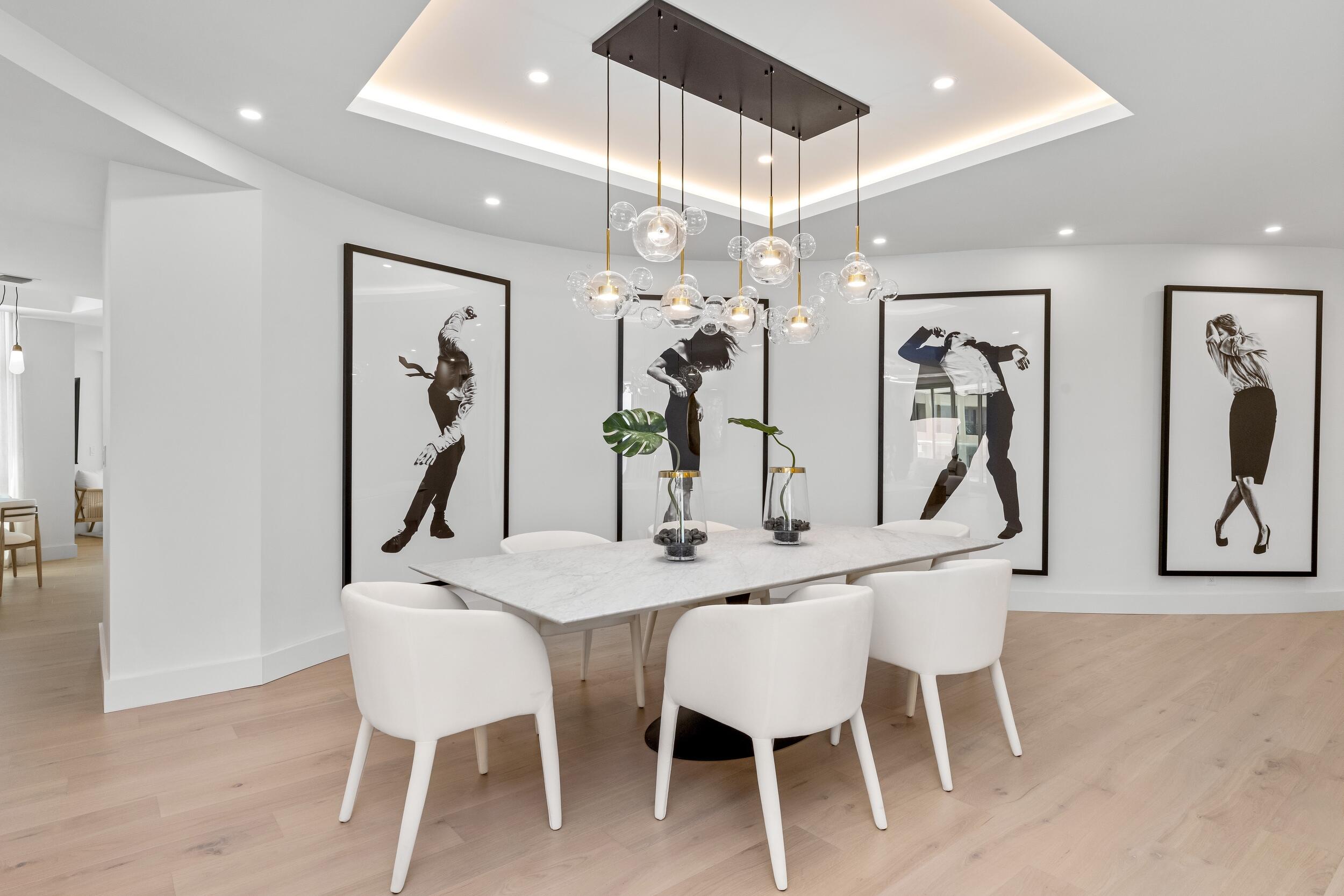 2494 South Ocean Boulevard, Unit C5 Boca Raton, FL 33432 - Photo 15 of 52 a view of a dining room with furniture and chandelier