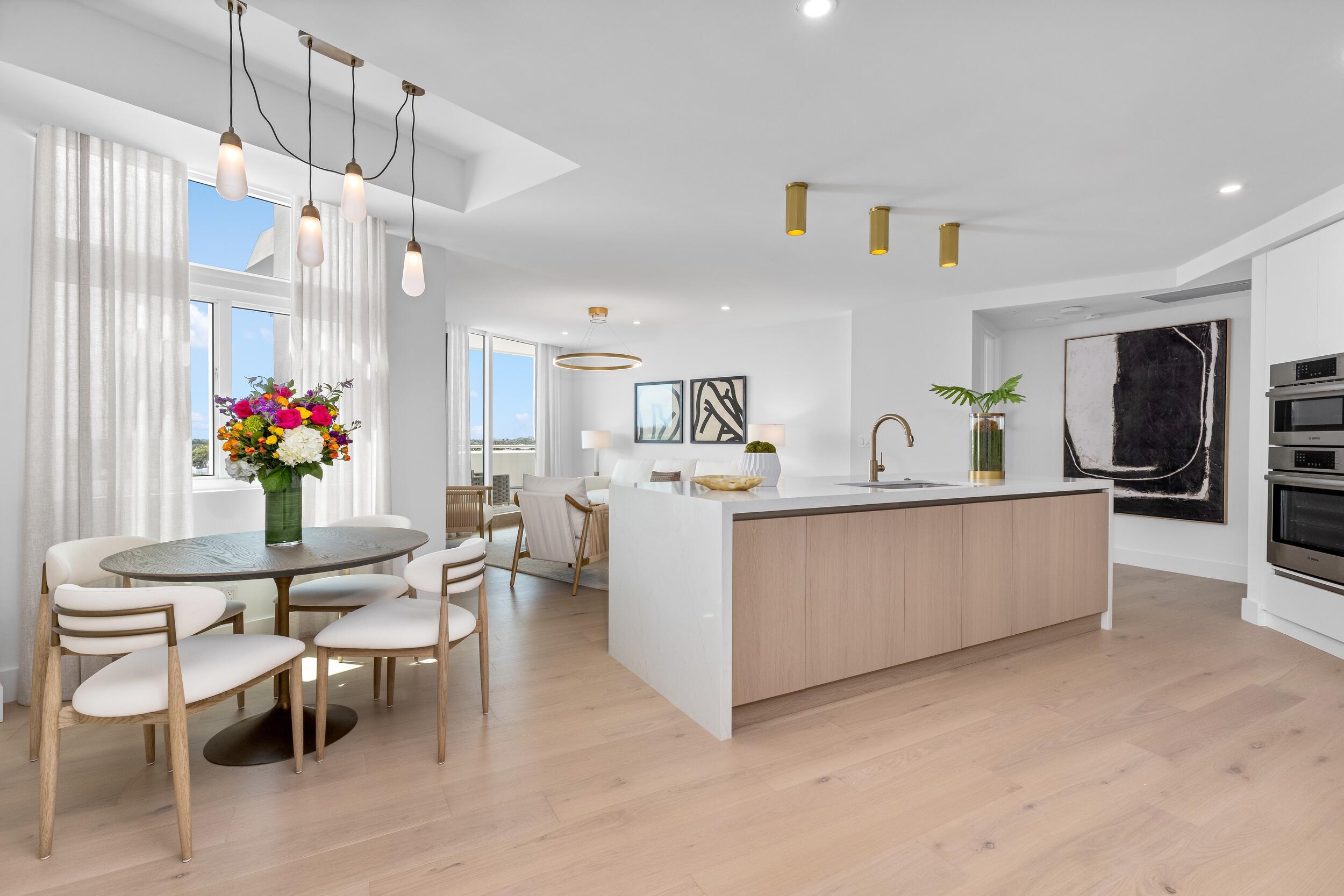 2494 South Ocean Boulevard, Unit C5 Boca Raton, FL 33432 - Photo 19 of 52 a view of kitchen with furniture and wooden floor