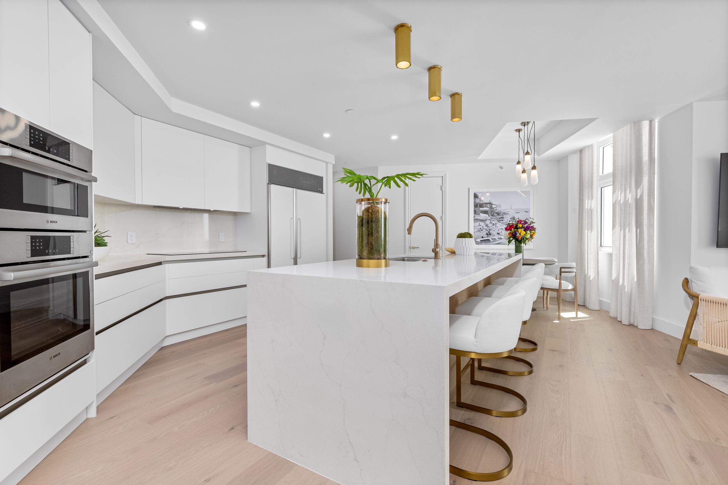 2494 South Ocean Boulevard, Unit C5 Boca Raton, FL 33432 - Photo 21 of 52 a kitchen with counter top space appliances and cabinets