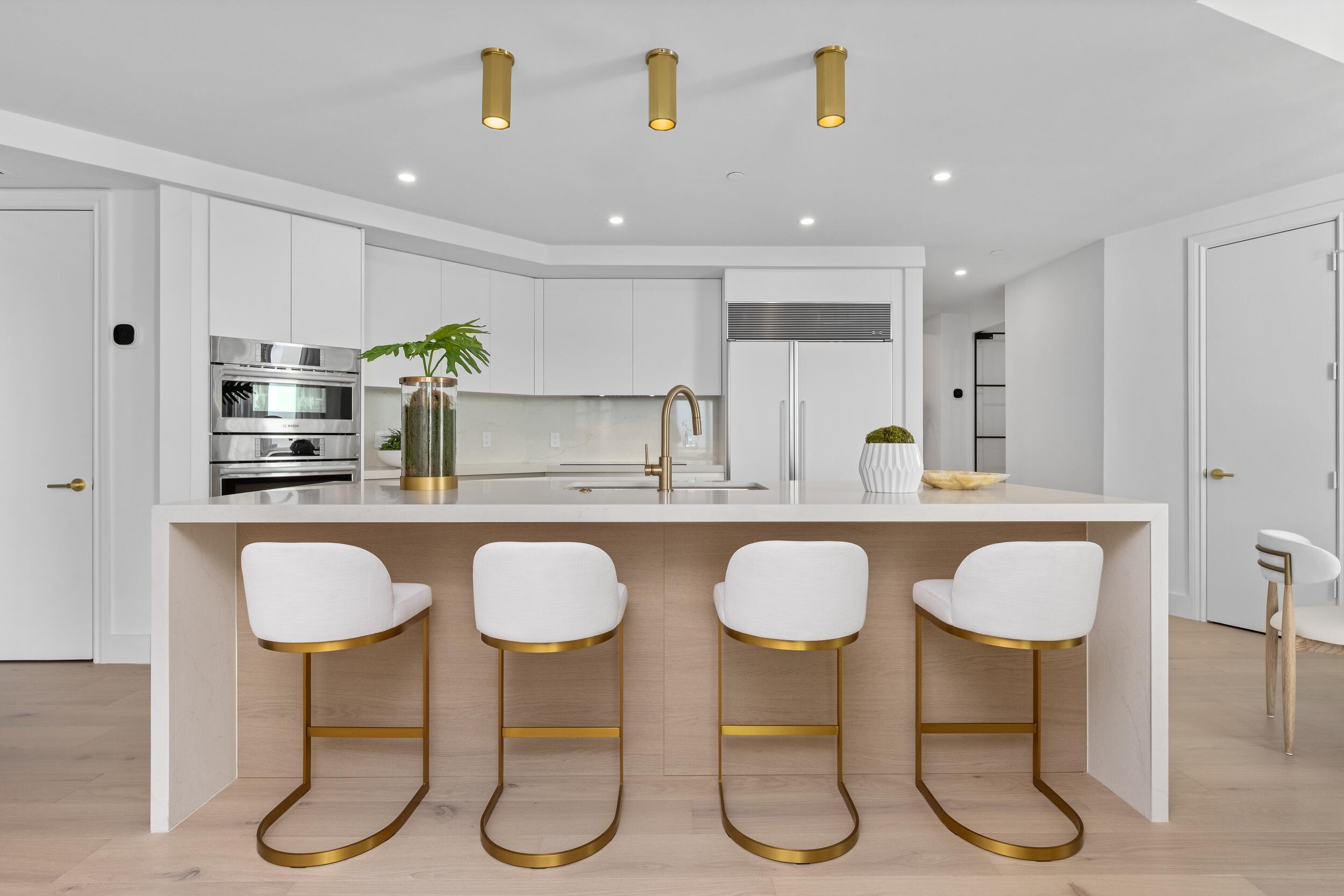 2494 South Ocean Boulevard, Unit C5 Boca Raton, FL 33432 - Photo 24 of 52 a kitchen with table and chairs