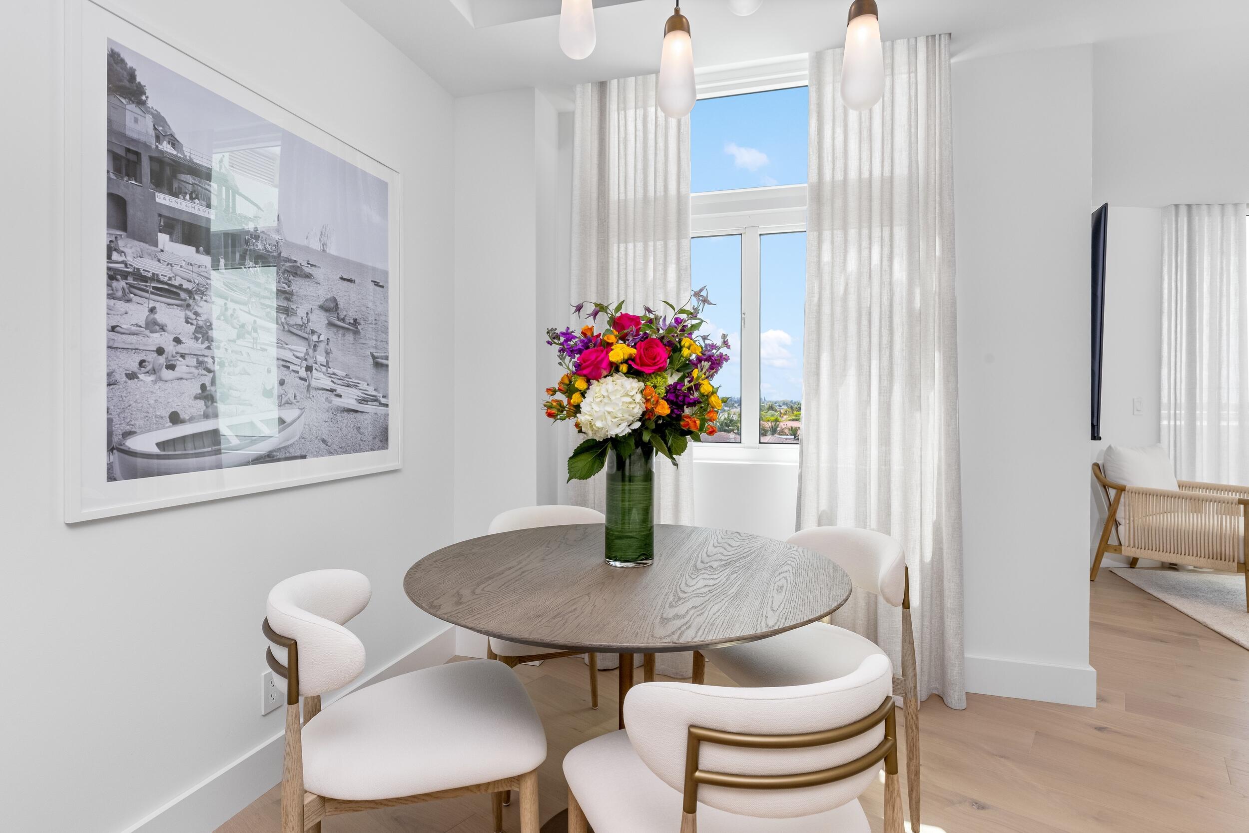 2494 South Ocean Boulevard, Unit C5 Boca Raton, FL 33432 - Photo 25 of 52 a dining room with furniture and wooden floor