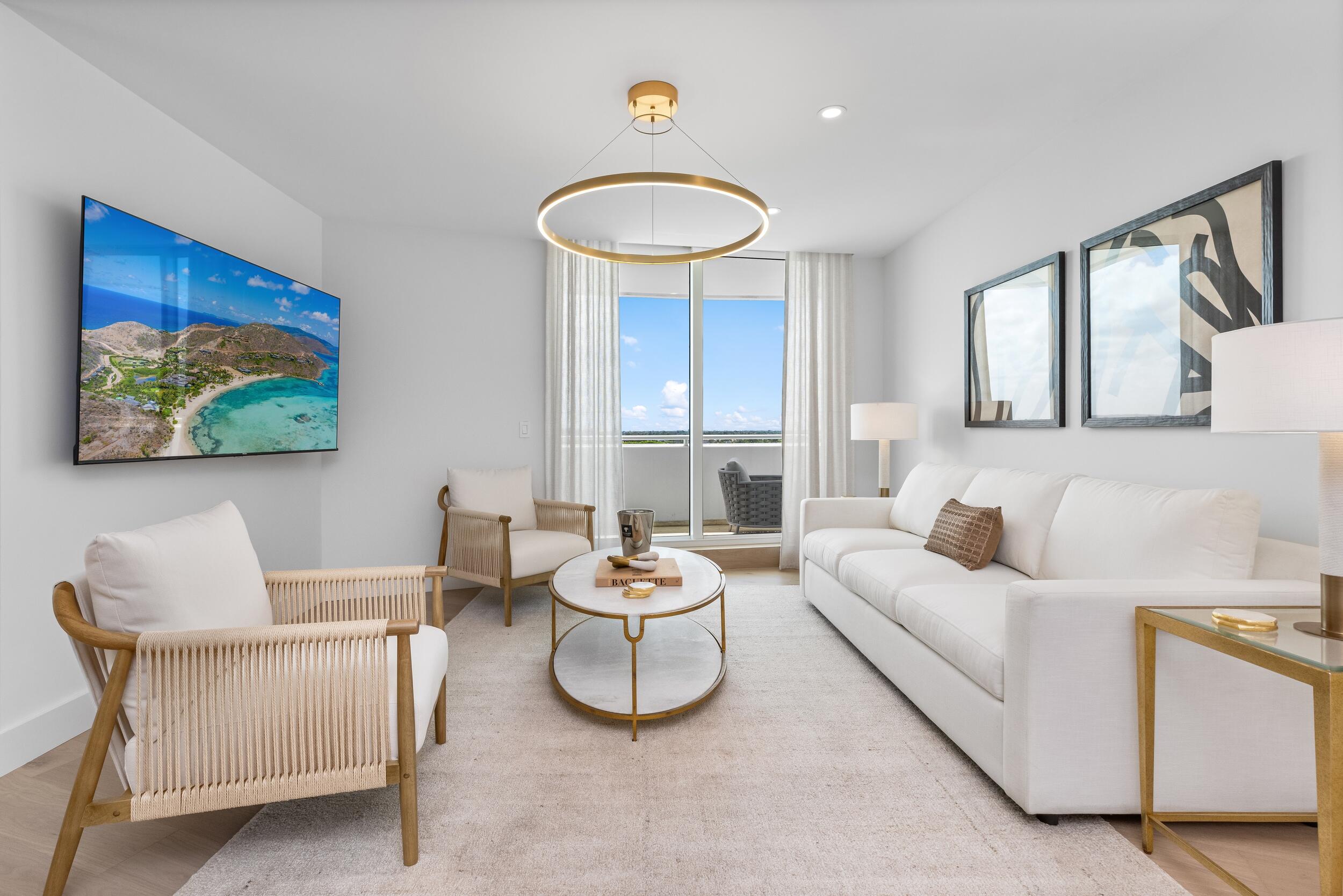 2494 South Ocean Boulevard, Unit C5 Boca Raton, FL 33432 - Photo 26 of 52 a living room with furniture and a wooden floor