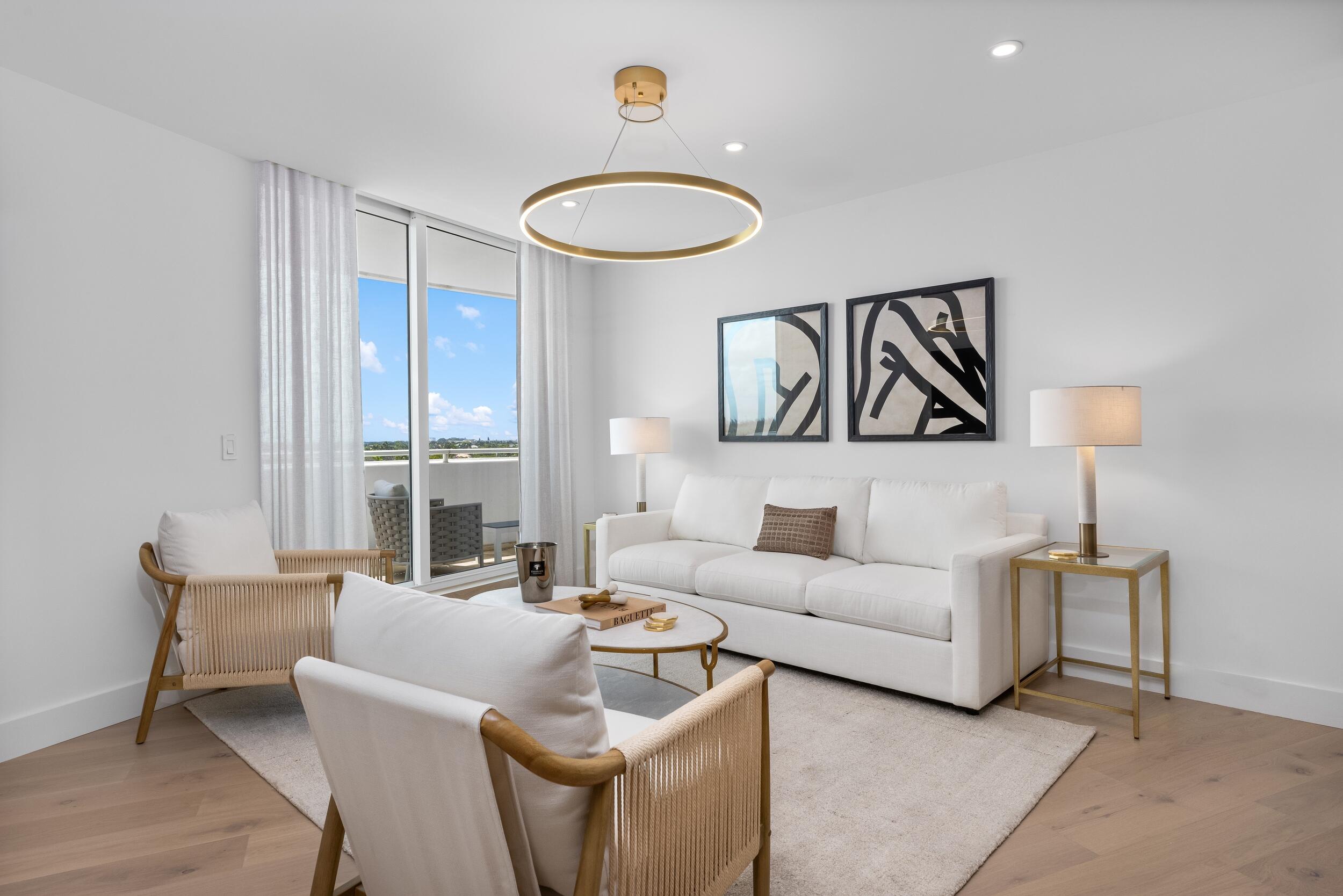 2494 South Ocean Boulevard, Unit C5 Boca Raton, FL 33432 - Photo 27 of 52 a living room with furniture and a large window