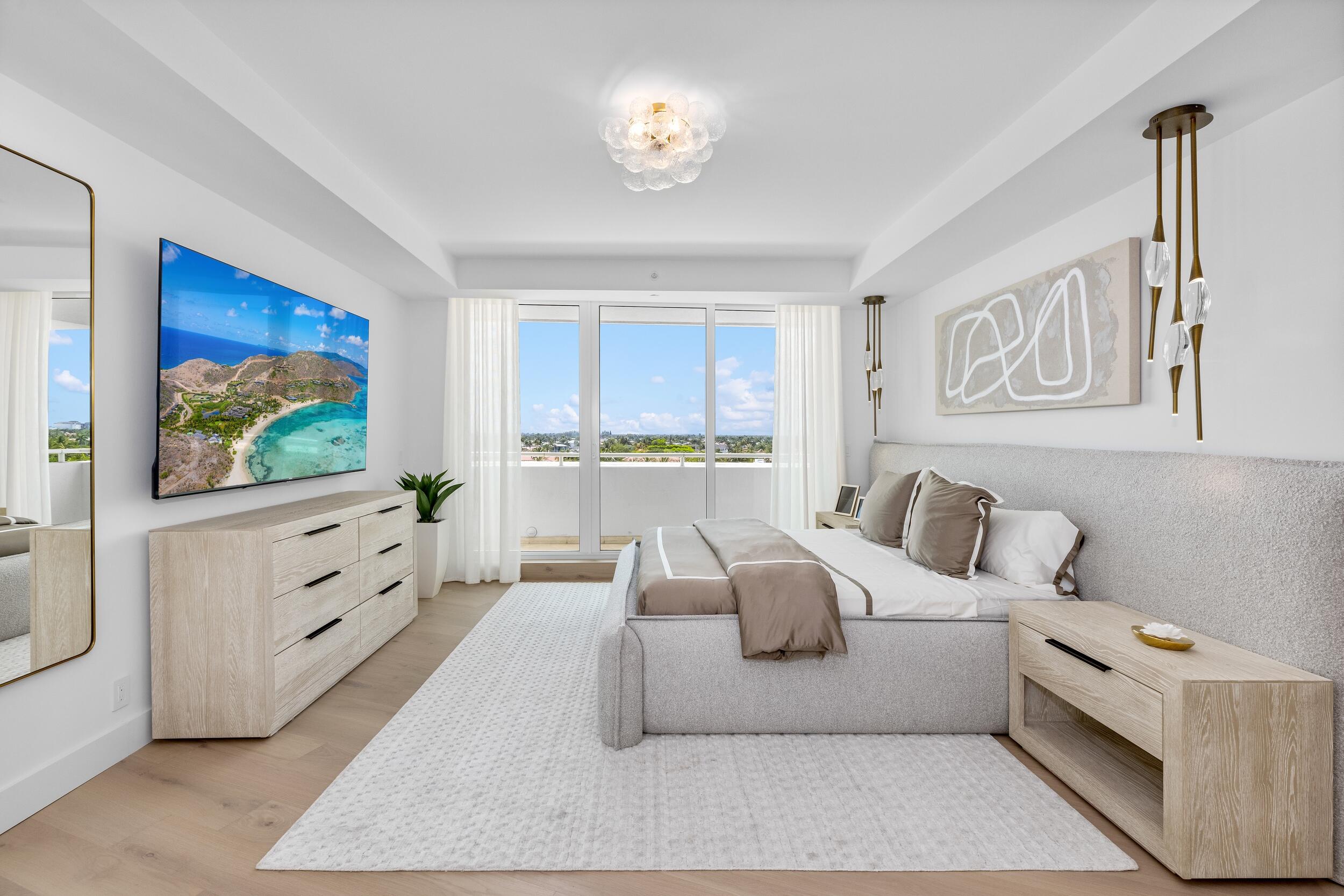 2494 South Ocean Boulevard, Unit C5 Boca Raton, FL 33432 - Photo 29 of 52 a living room with furniture a flat screen tv and a window