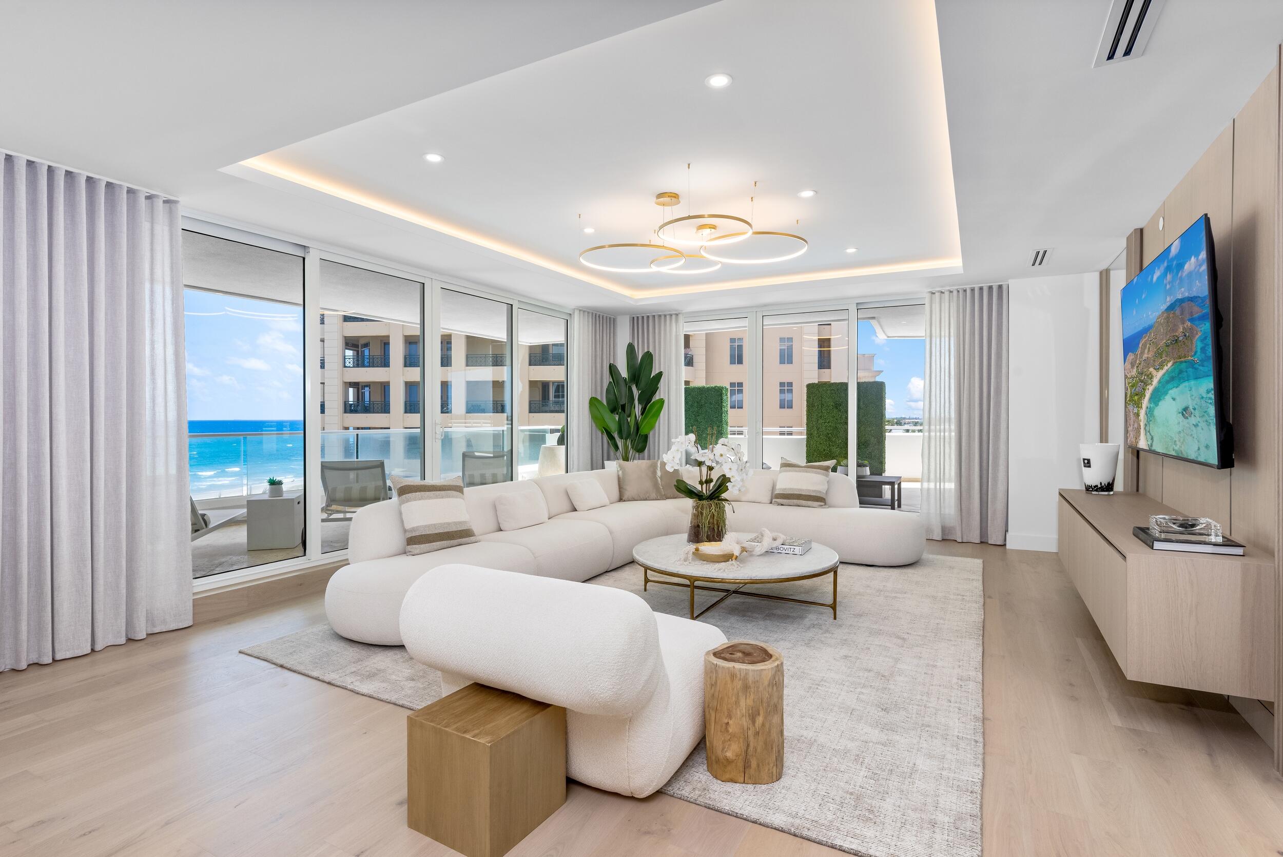 2494 South Ocean Boulevard, Unit C5 Boca Raton, FL 33432 - Photo 4 of 52 a living room with furniture and a flat screen tv