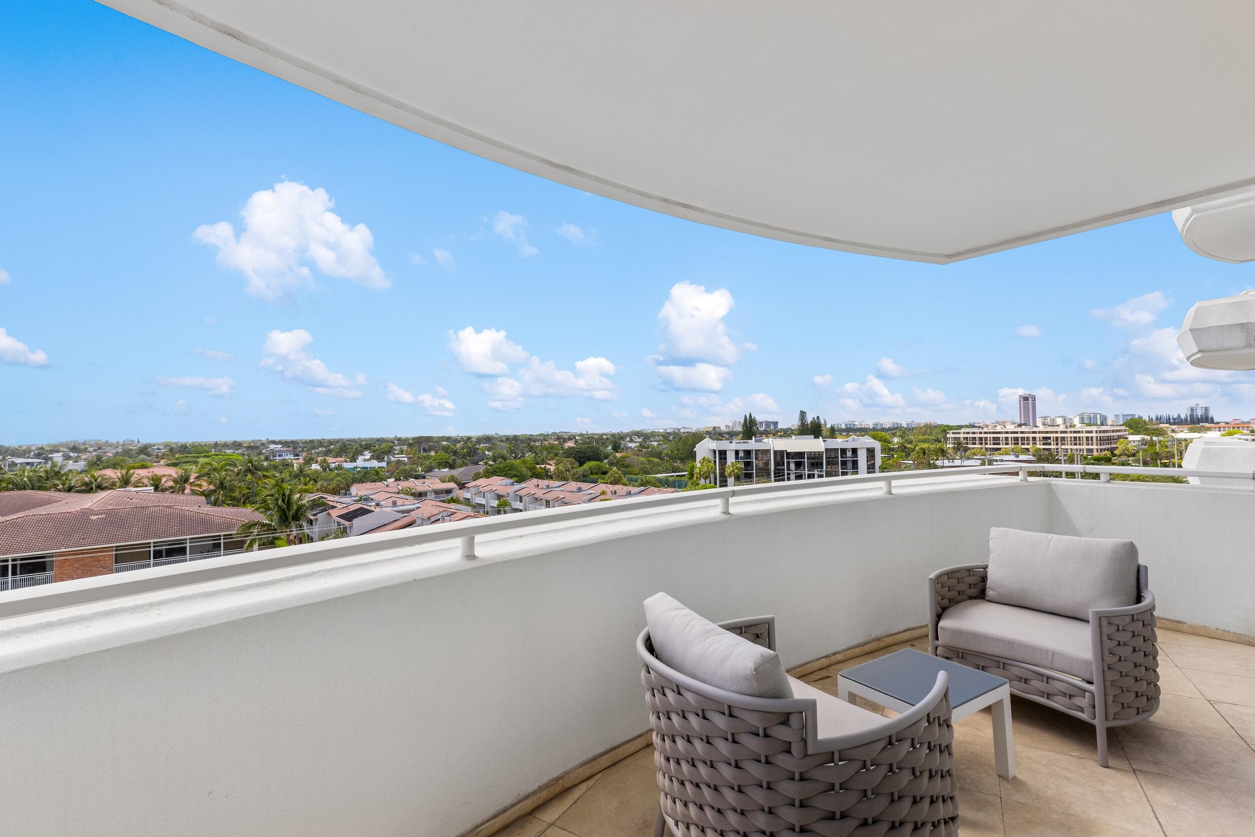 2494 South Ocean Boulevard, Unit C5 Boca Raton, FL 33432 - Photo 45 of 52 a view of roof deck with seating space and a ocean view