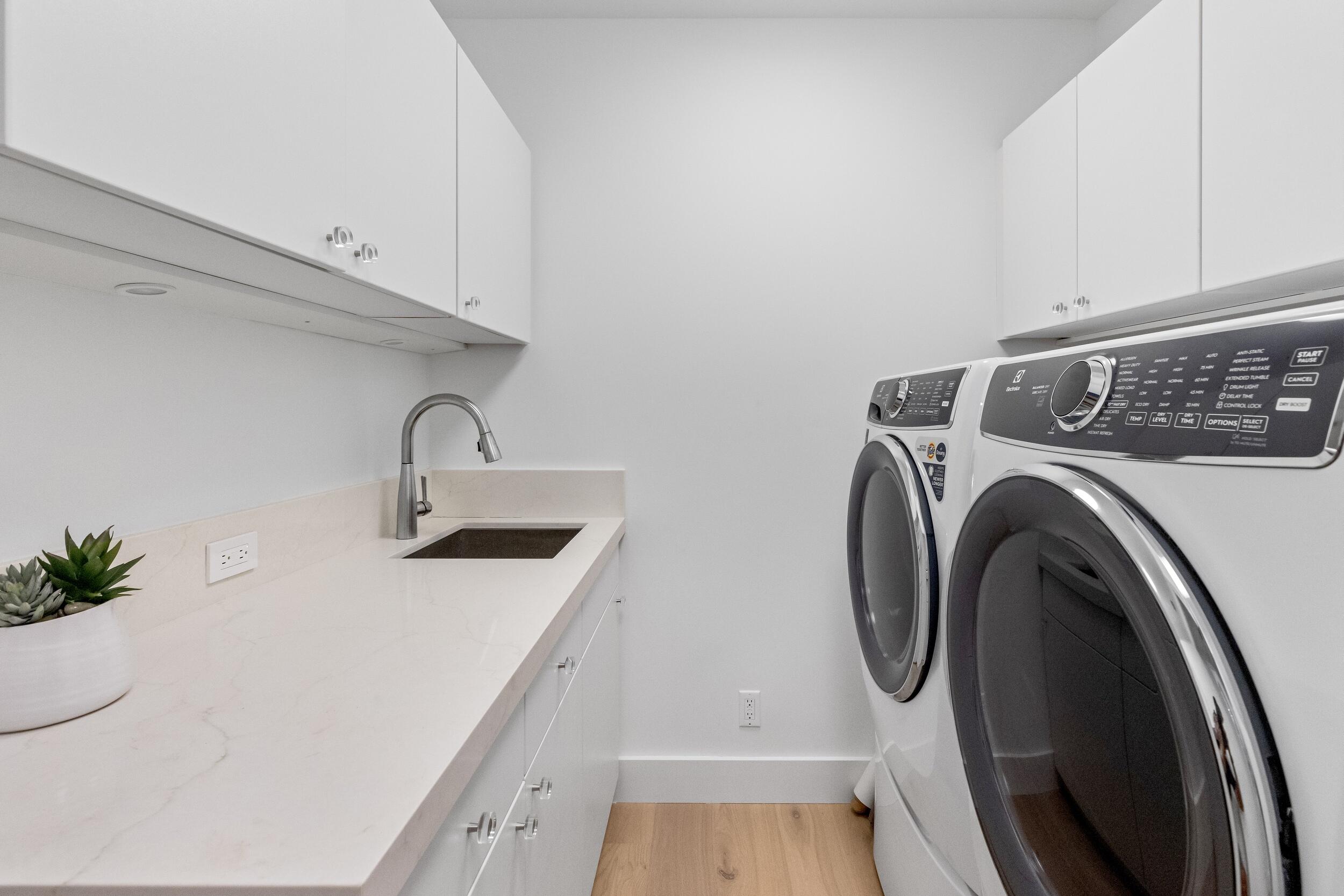 2494 South Ocean Boulevard, Unit C5 Boca Raton, FL 33432 - Photo 51 of 52 a utility room with sink dryer and washer