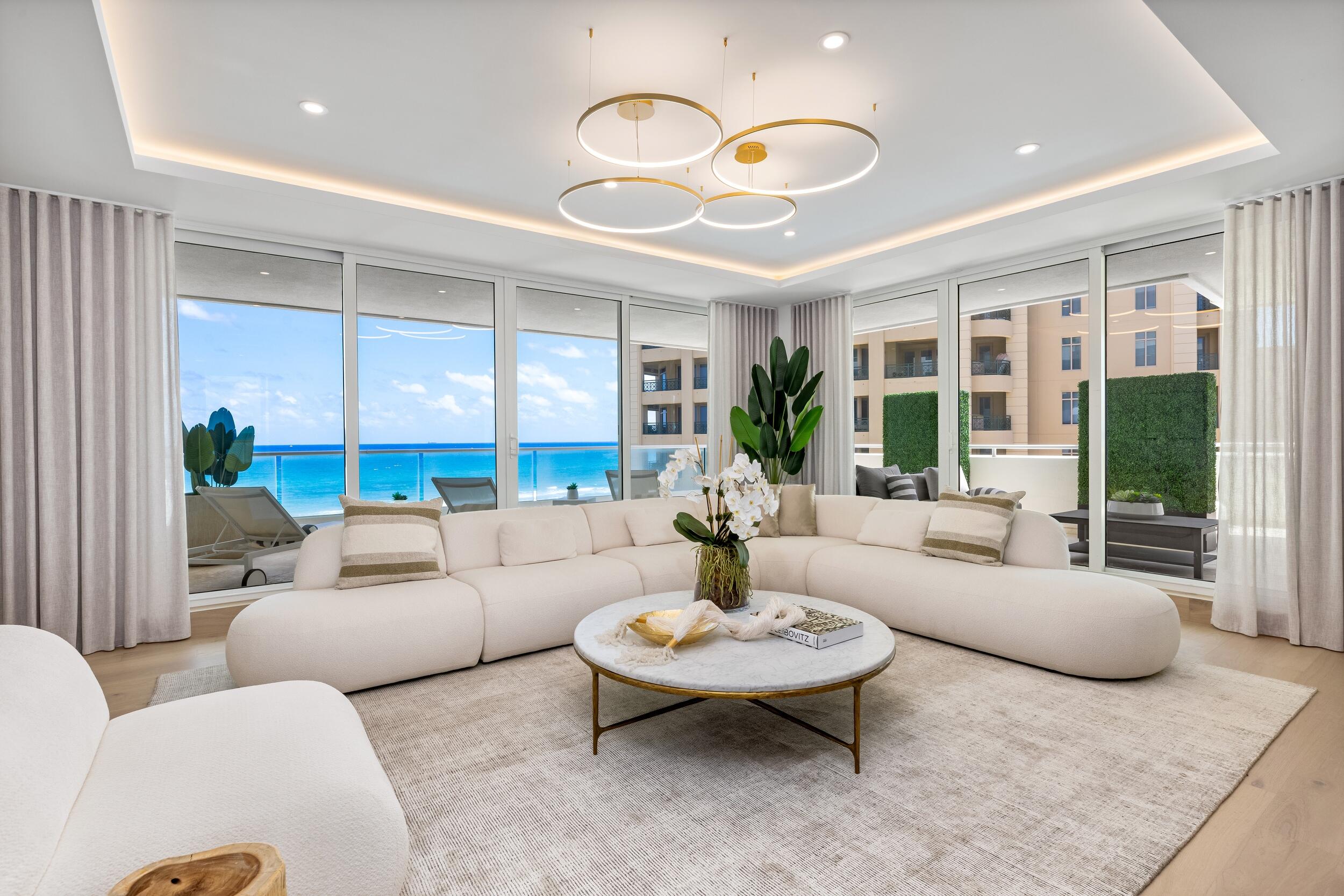 2494 South Ocean Boulevard, Unit C5 Boca Raton, FL 33432 - Photo 9 of 52 a living room with furniture and a large window