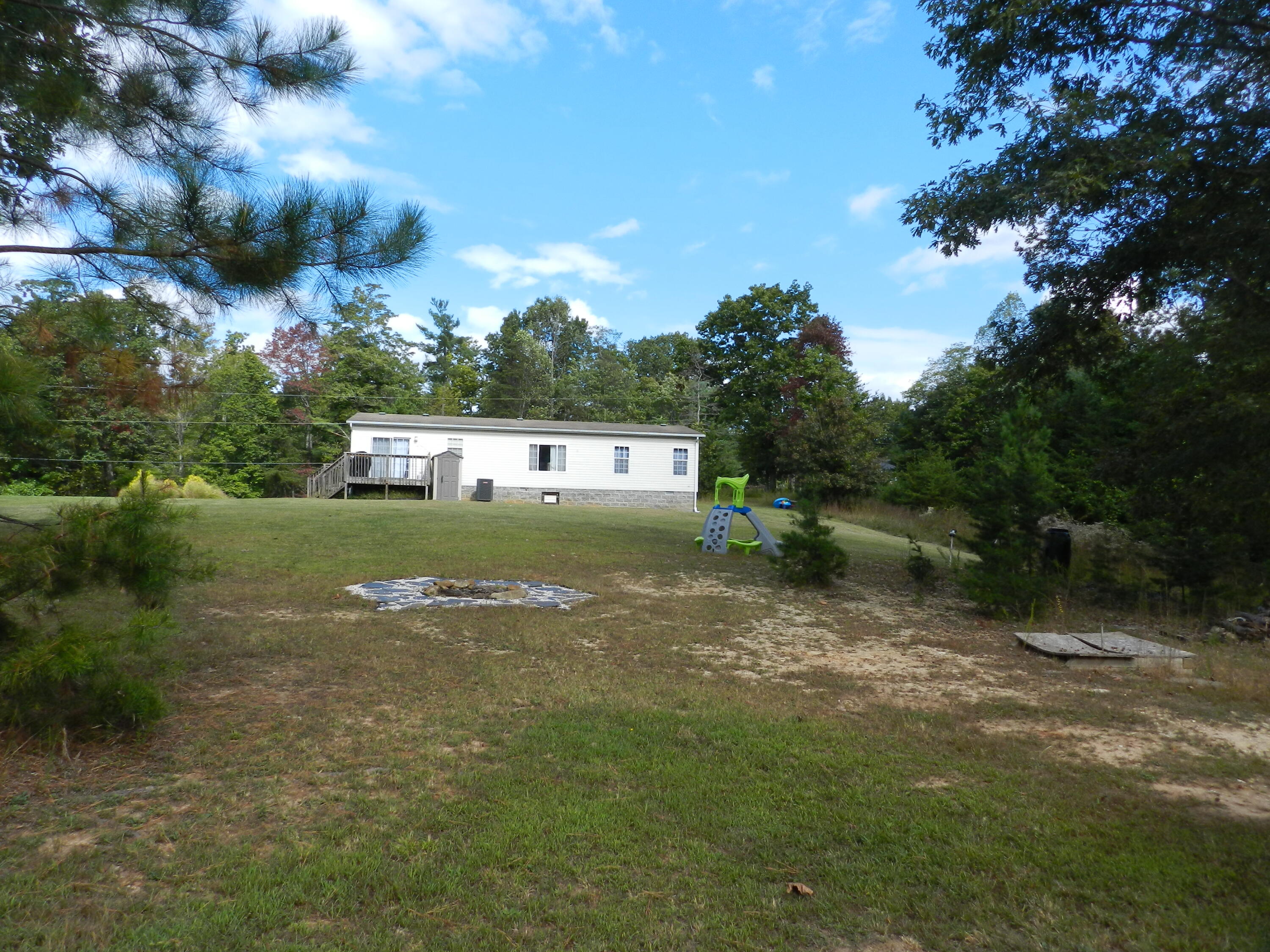 300 White Oak Road Boones Mill, VA 24065 - Photo 23 of 28 a view of a house with a yard