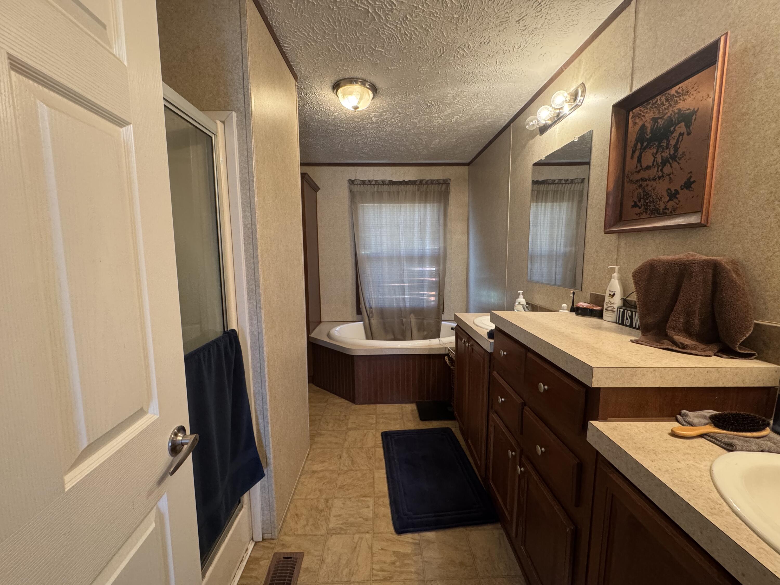 300 White Oak Road Boones Mill, VA 24065 - Photo 7 of 28 a kitchen with a sink and a refrigerator