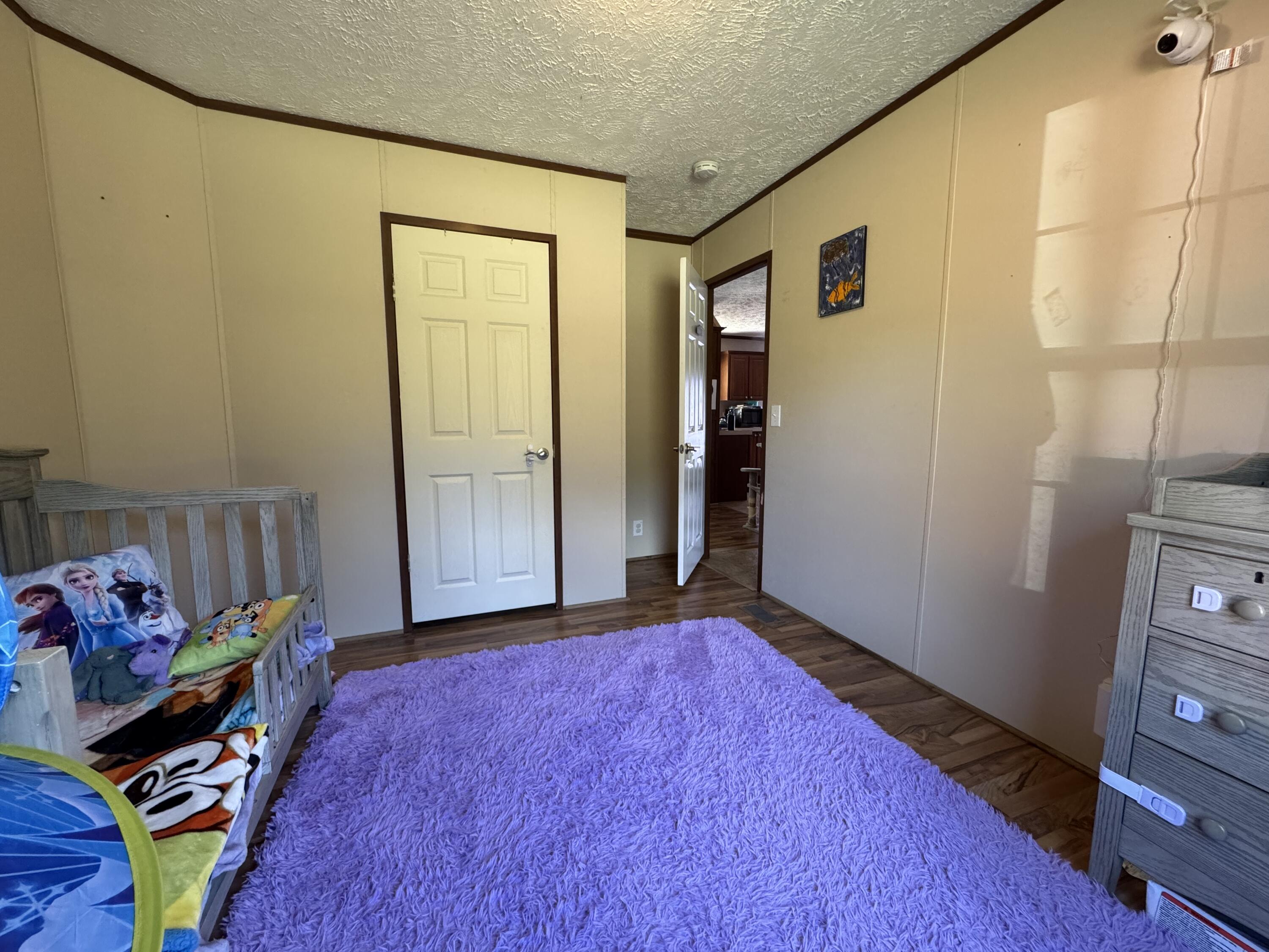 300 White Oak Road Boones Mill, VA 24065 - Photo 10 of 28 a view of an empty room and wooden floor