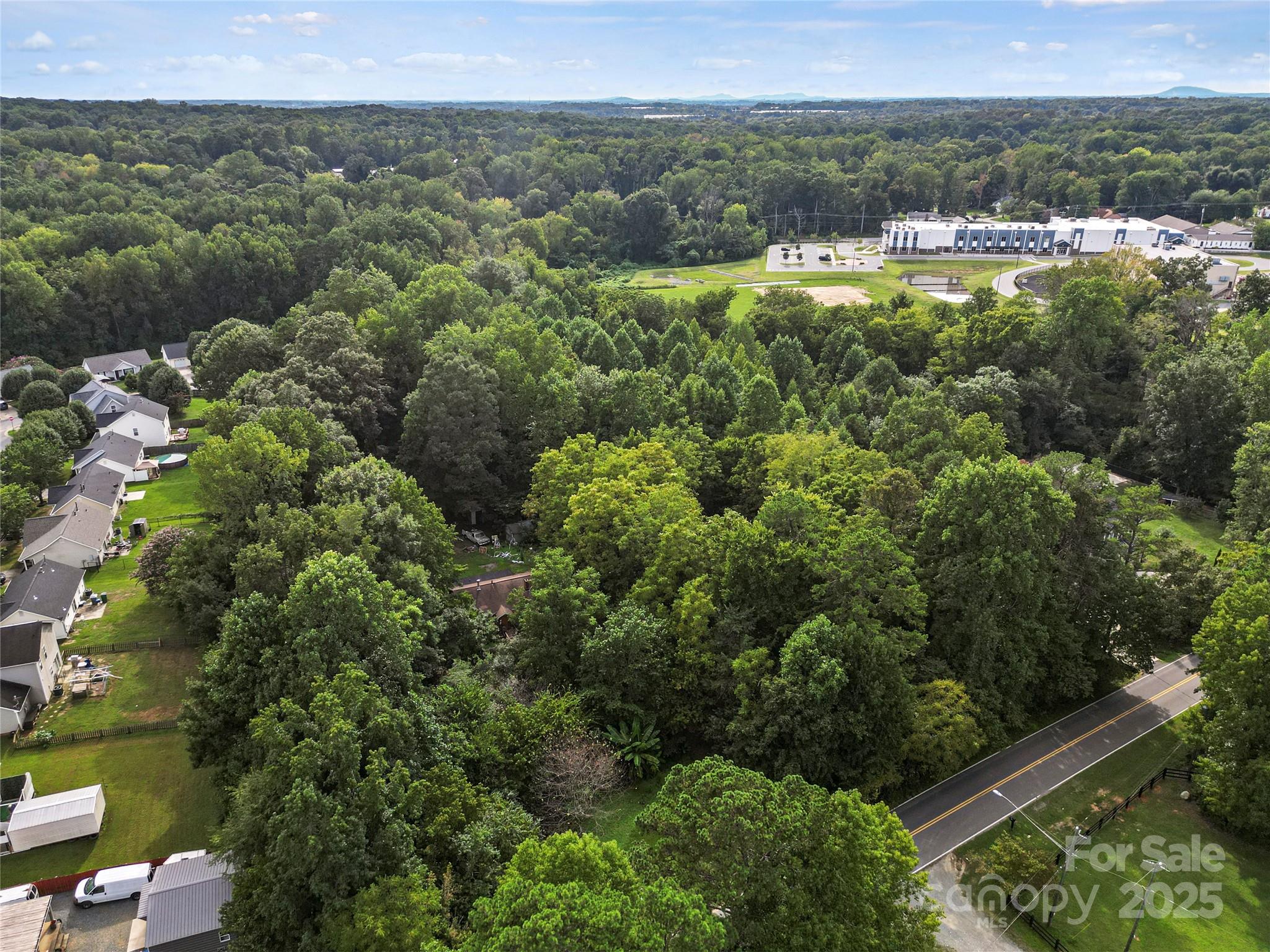 6109 Paw Creek Road Charlotte, NC 28214 - Photo 12 of 18 an aerial view of a houses with a yard
