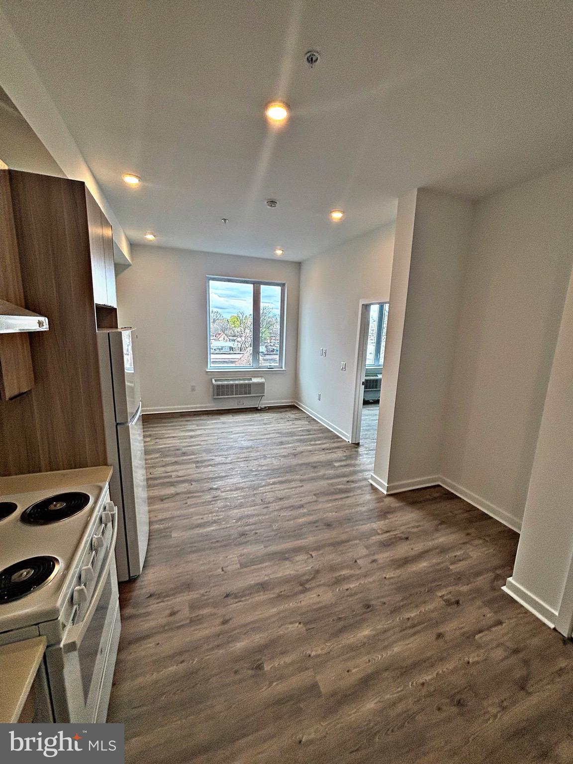 7101 Woodland Avenue, Unit 201 Philadelphia, PA 19142 - Photo 9 of 14 Living & Kitchen Room