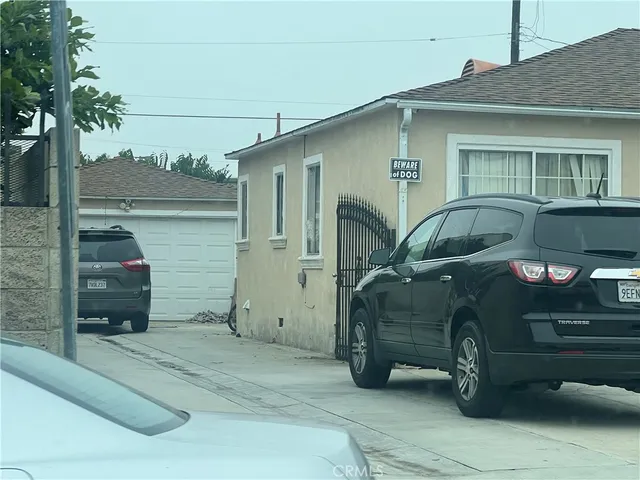 a front view of a house with garage