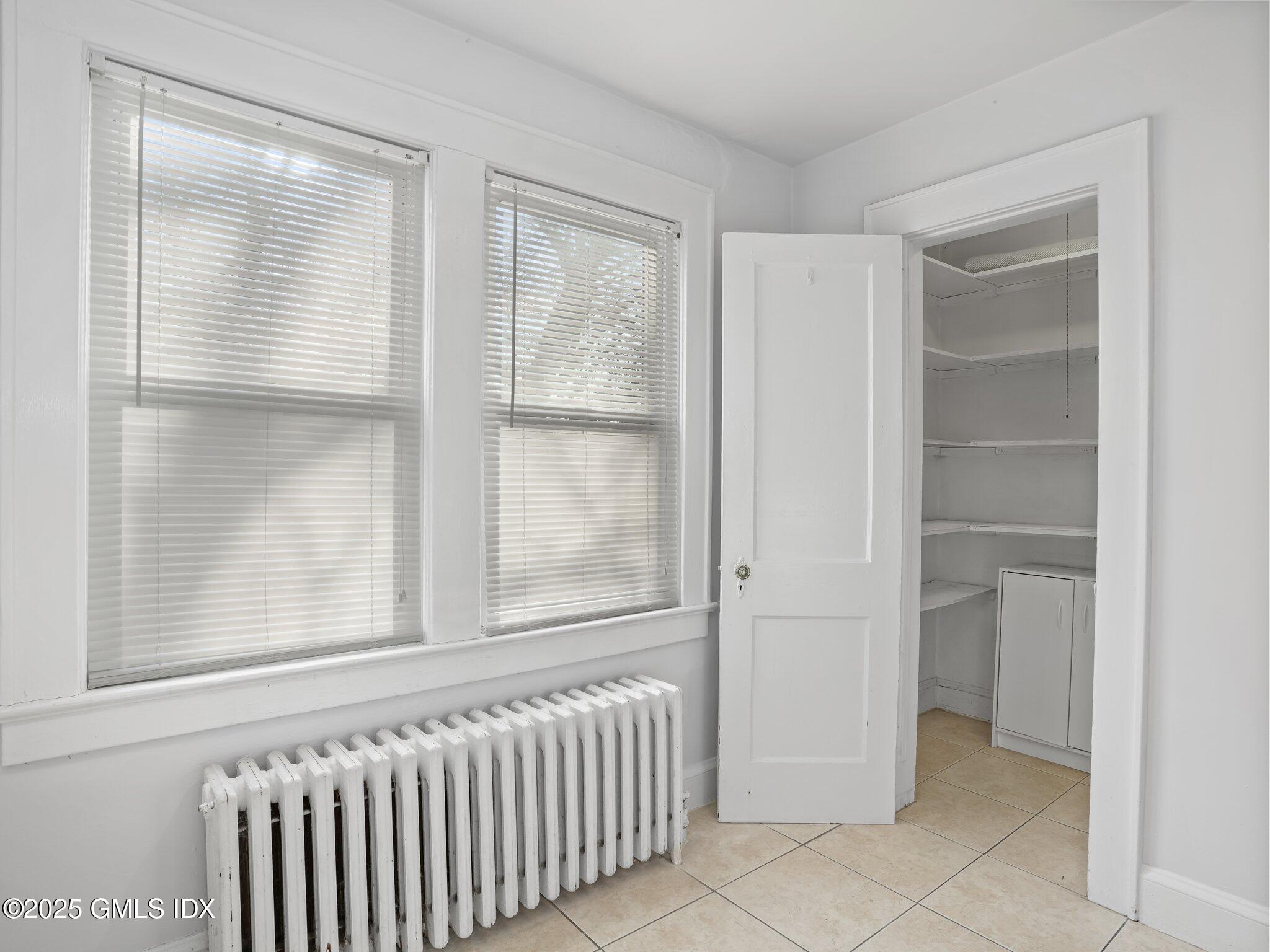 37 High Street, Unit 2 Greenwich, CT 06830 - Photo 11 of 23 a view of an empty room with a window