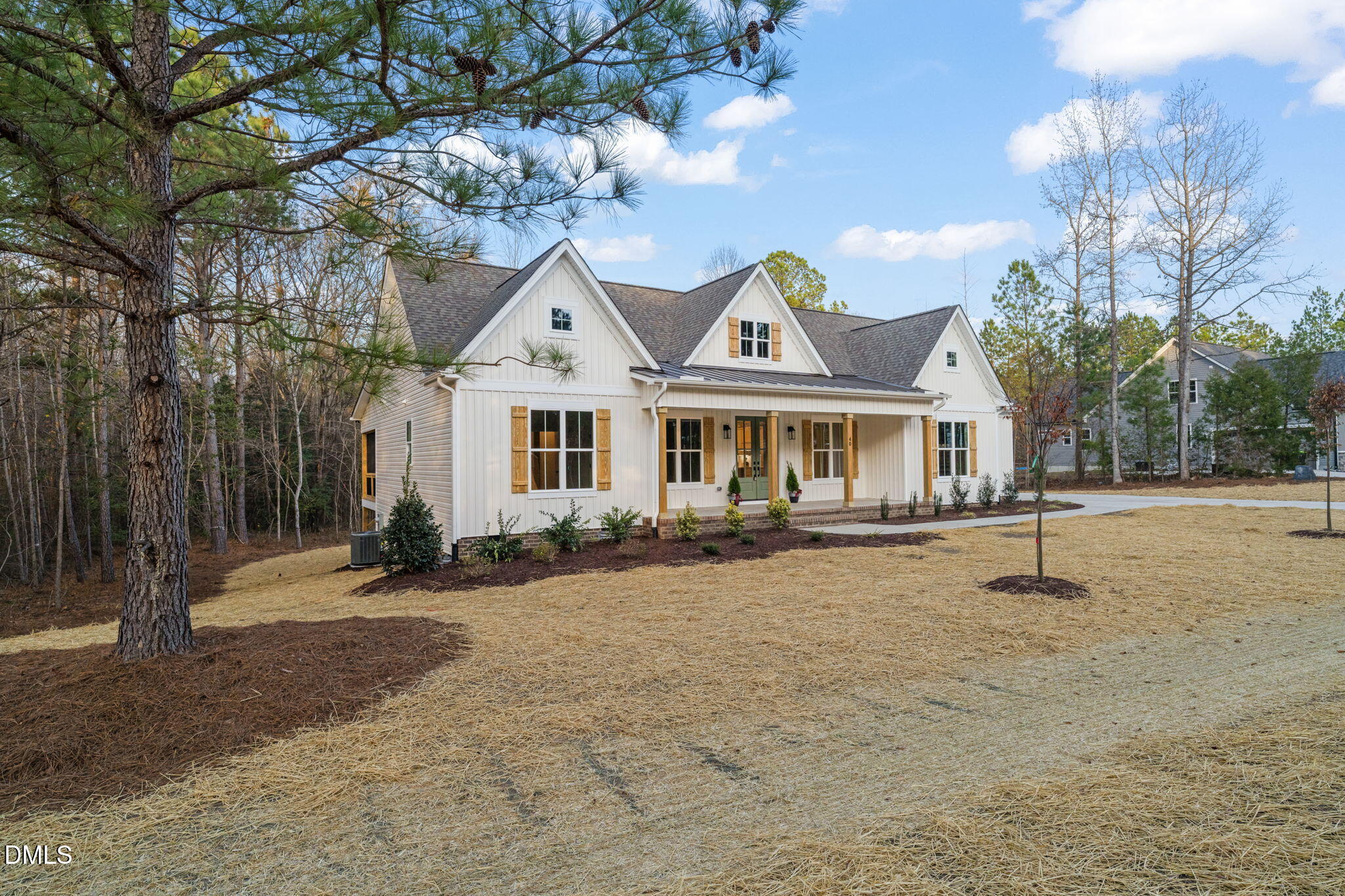 40 Beauview Way Zebulon, NC 27597 - Photo 2 of 52 a front view of a house with a yard