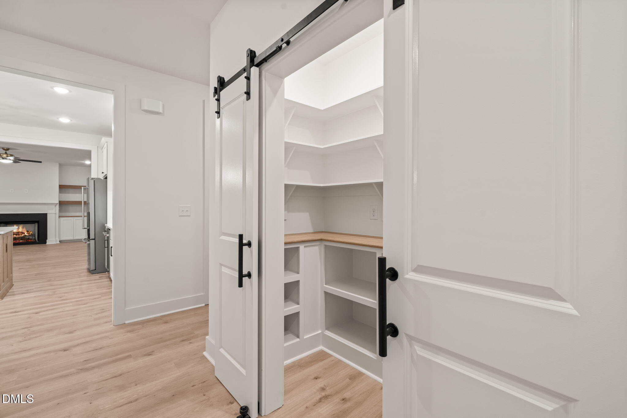 40 Beauview Way Zebulon, NC 27597 - Photo 21 of 52 a view of walk in closet with empty racks