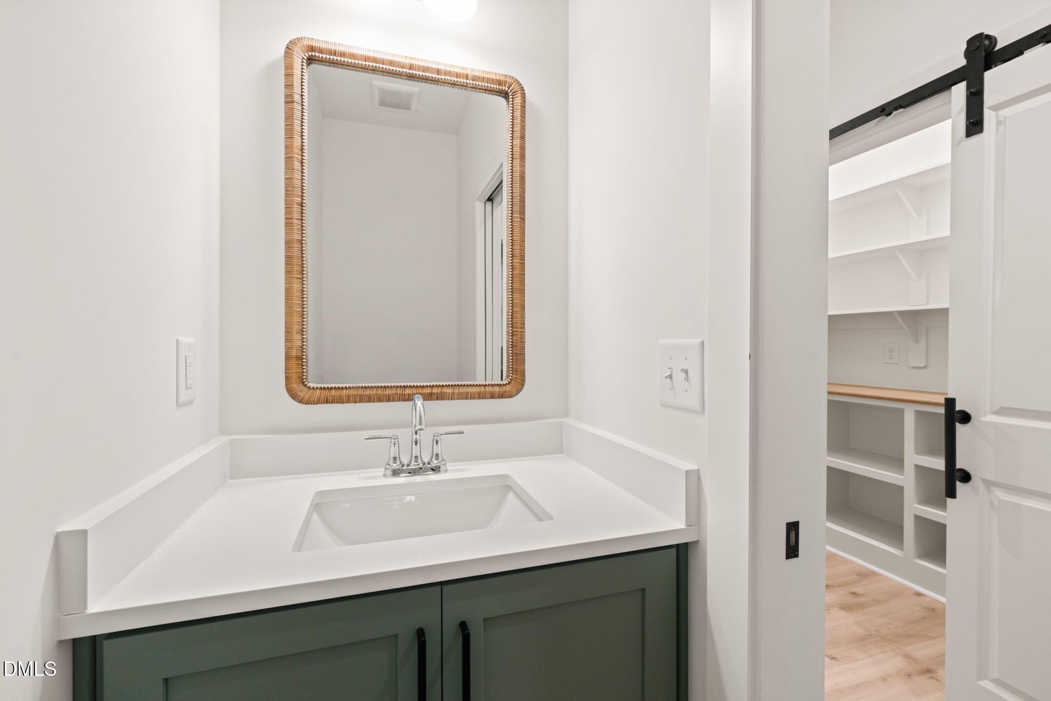40 Beauview Way Zebulon, NC 27597 - Photo 24 of 52 a bathroom with a sink and a mirror