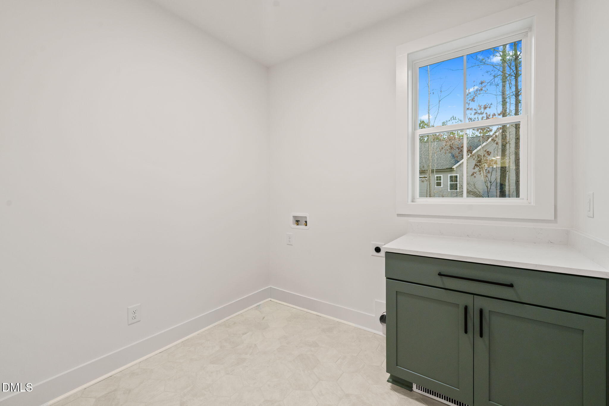 40 Beauview Way Zebulon, NC 27597 - Photo 25 of 52 a room with a window and a sink