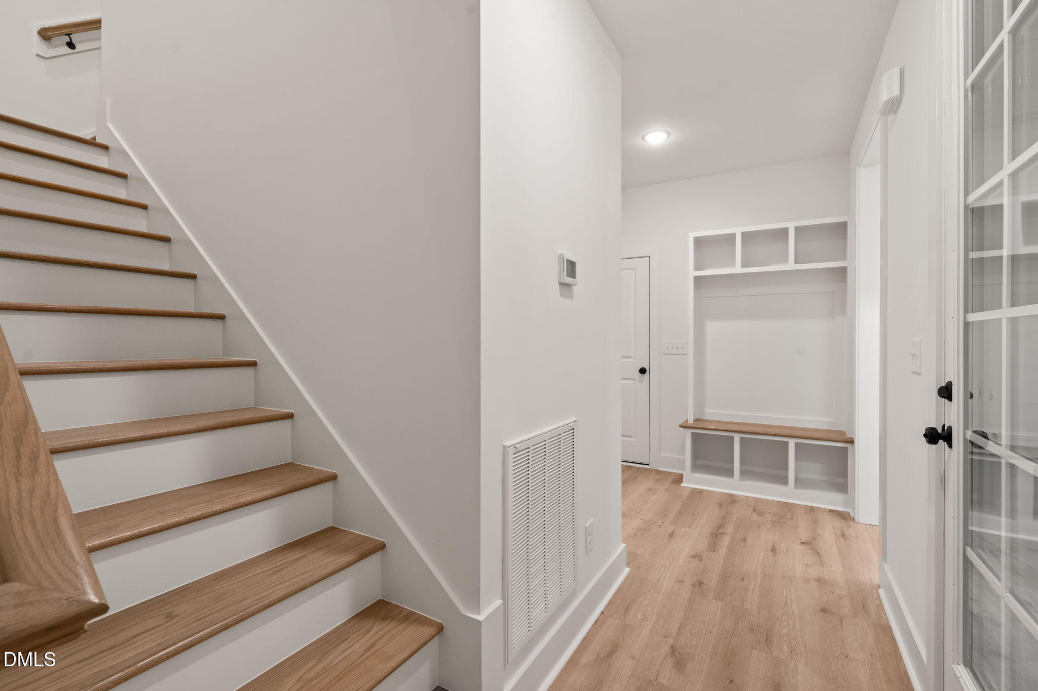 40 Beauview Way Zebulon, NC 27597 - Photo 26 of 52 a view of a hallway with wooden floor and entryway