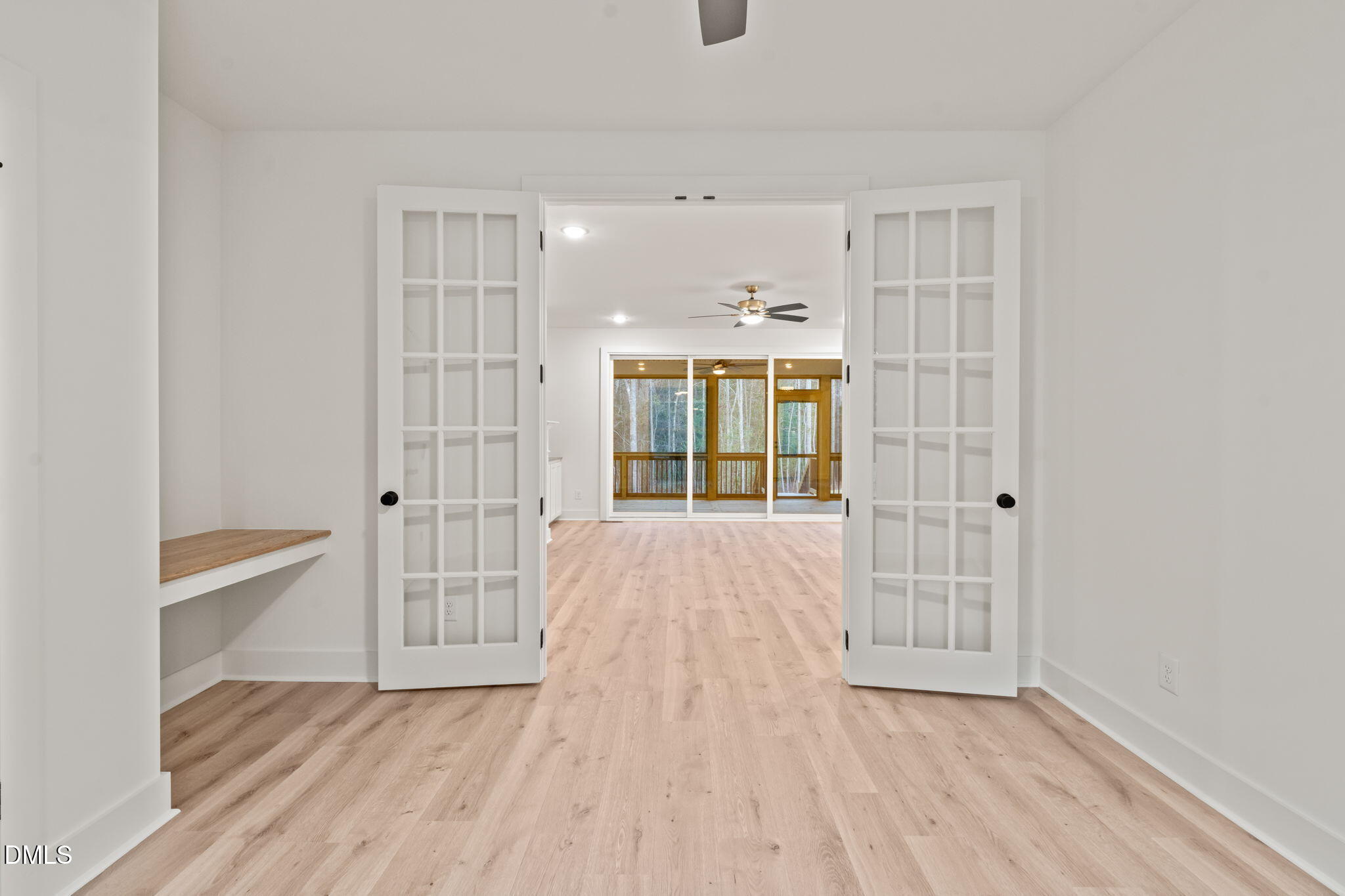 40 Beauview Way Zebulon, NC 27597 - Photo 28 of 52 wooden floor in an empty room with a window