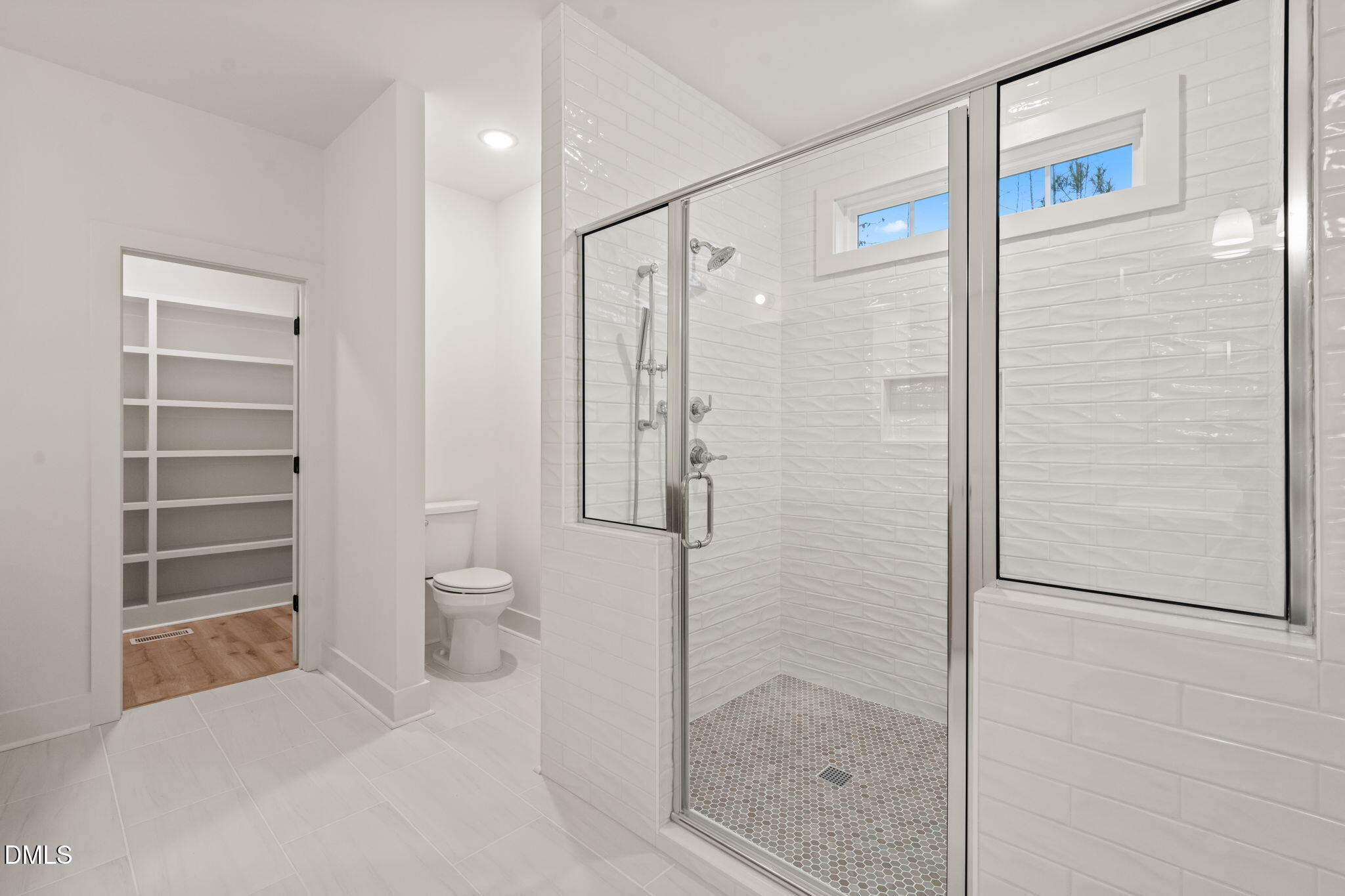 40 Beauview Way Zebulon, NC 27597 - Photo 36 of 52 a bathroom with a shower and a toilet