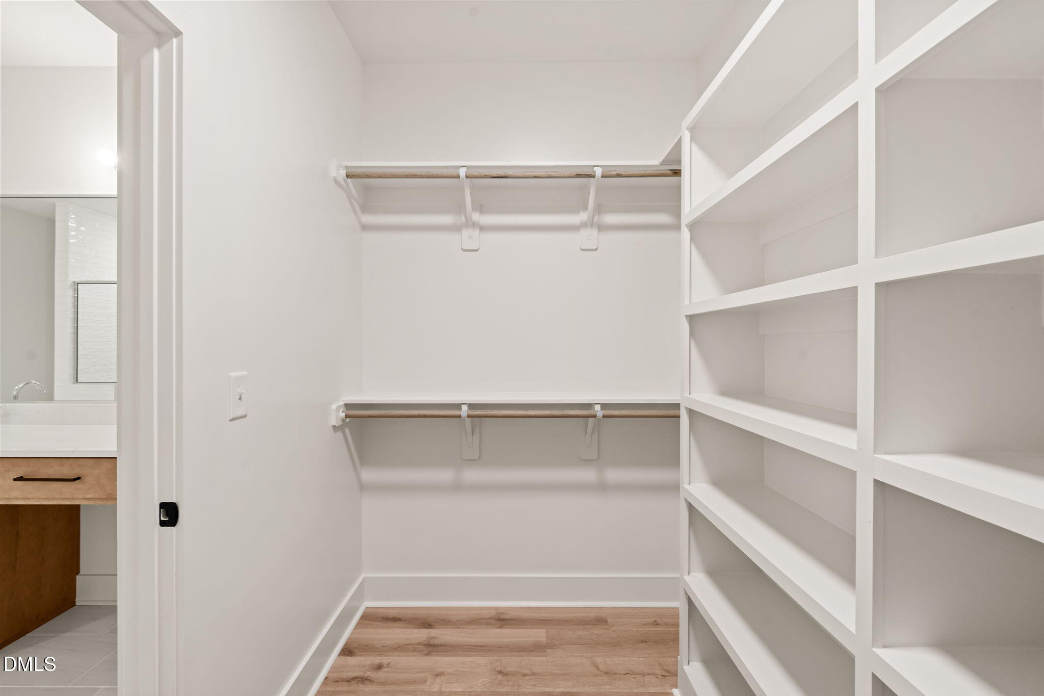 40 Beauview Way Zebulon, NC 27597 - Photo 39 of 52 a view of an empty walk in closet