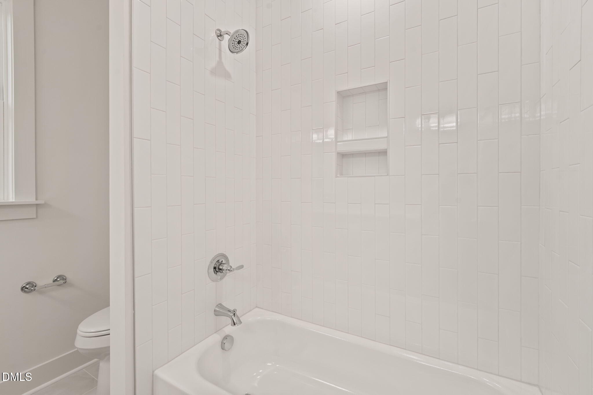 40 Beauview Way Zebulon, NC 27597 - Photo 43 of 52 a bathroom with a bathtub