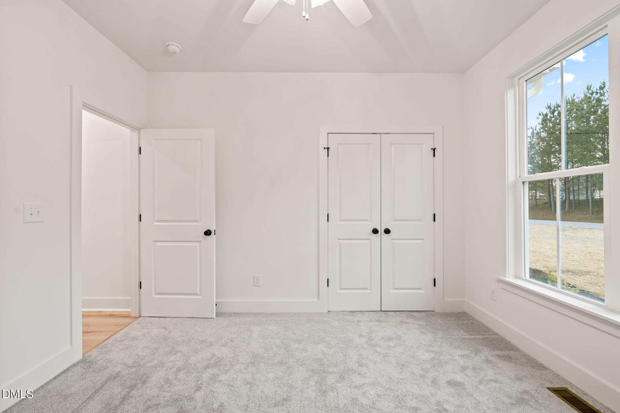 40 Beauview Way Zebulon, NC 27597 - Photo 44 of 52 a view of an empty room with a window