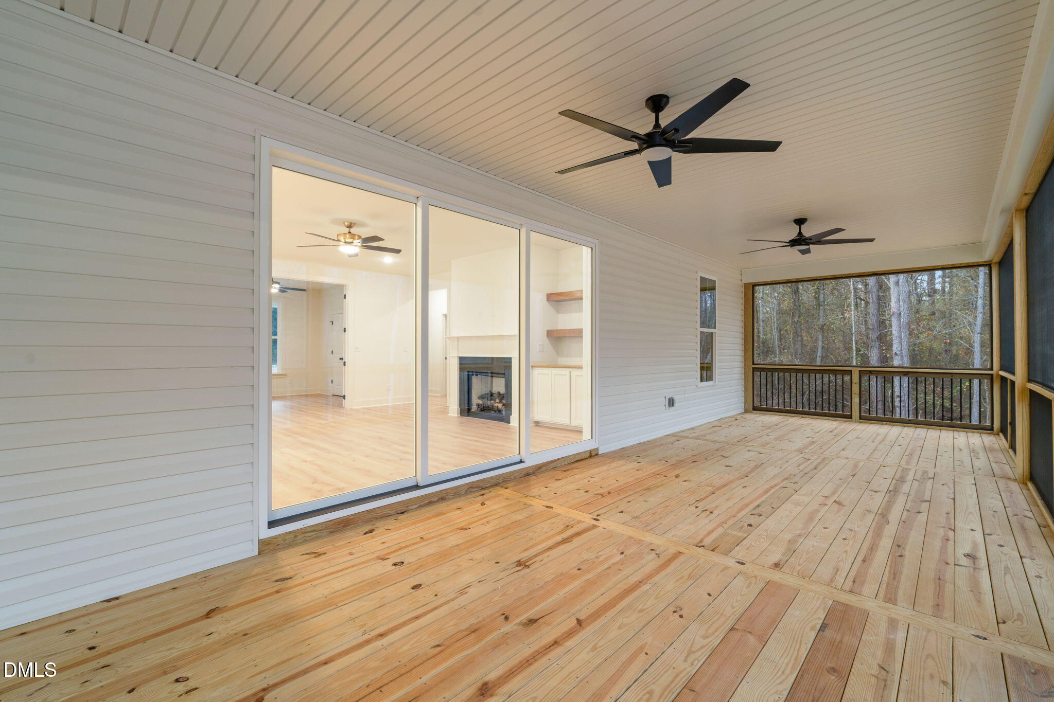40 Beauview Way Zebulon, NC 27597 - Photo 46 of 52 a view of empty room with wooden floor and fan