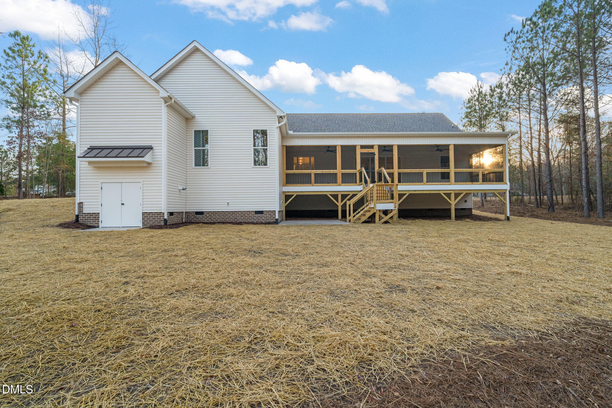 40 Beauview Way Zebulon, NC 27597 - Photo 49 of 52 a view of a house with a barbeque and large trees
