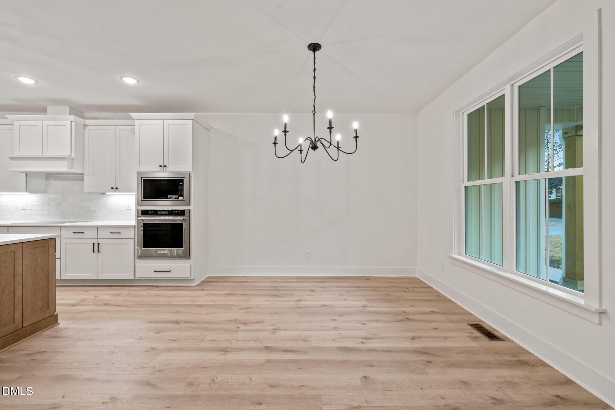 40 Beauview Way Zebulon, NC 27597 - Photo 7 of 52 a view of kitchen with granite countertop cabinets and refrigerator