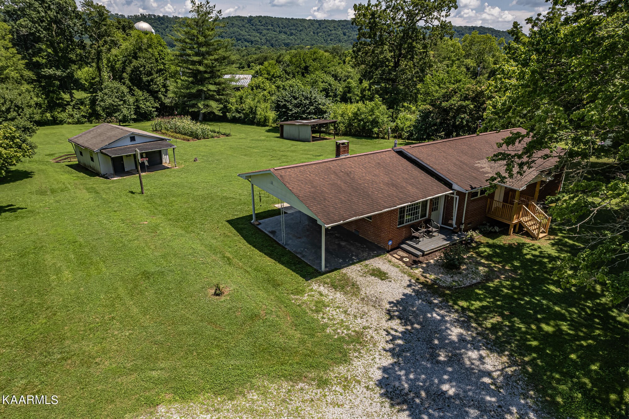 5251 Decatur Highway Ten Mile, TN 37880 - Photo 34 of 49 a view of a house with a yard