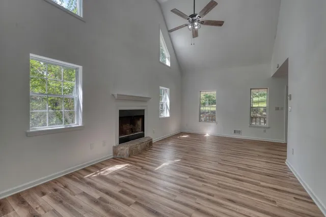 a view of a room with toys and a large window
