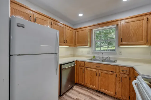 a view of a storage & utility room with wooden floor