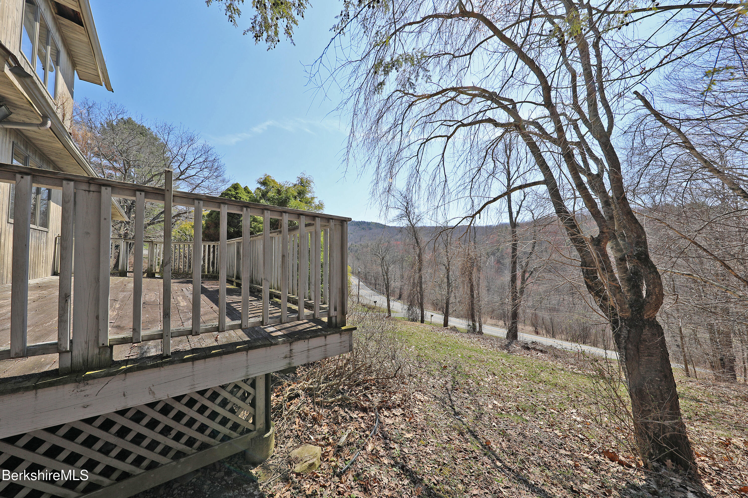 519 Kirchner Road Dalton, MA 01226 - Photo 5 of 42 a backyard of a house with lots of green space