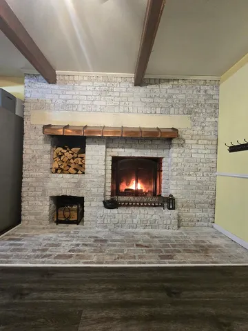 a living room with a fireplace