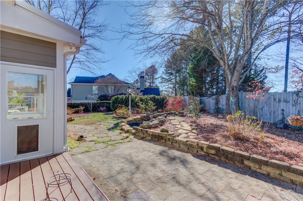 3317 Green Farm Trail Dacula, GA 30019 - Photo 35 of 45 a view of a backyard with a patio