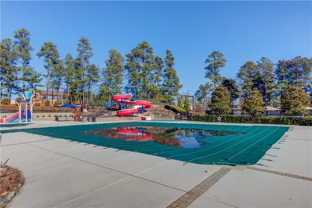 a view of a backyard of a house