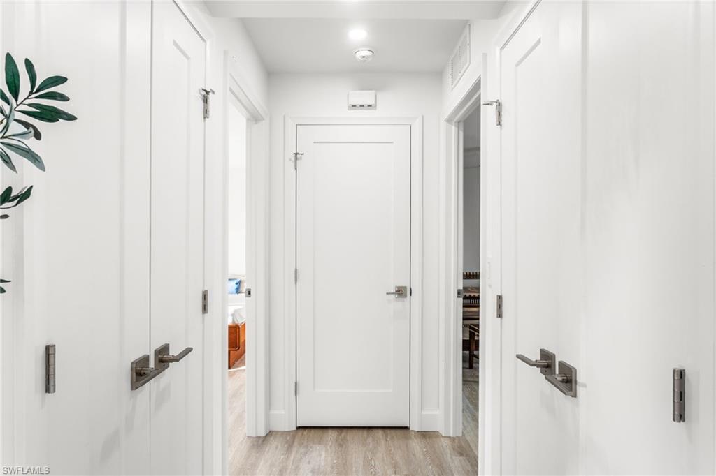 27682 Imperial River Road, Unit CH1 Bonita Springs, FL 34134 - Photo 7 of 24 a bathroom with a shower and a glass door