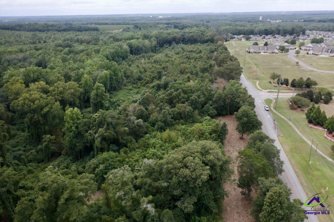 Airport Road Perry, GA 31069 - Photo 5 of 23 an aerial view of a city with lots of residential buildings and mountain view