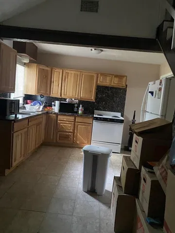 a bathroom with a shower and a tub