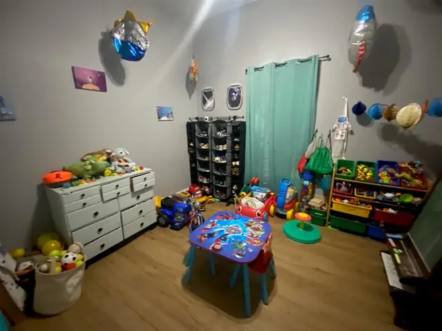 a room with toys and children play toys