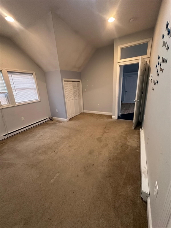 1295 Millbury Street, Unit B Worcester, MA 01607 - Photo 16 of 28 an empty room with windows