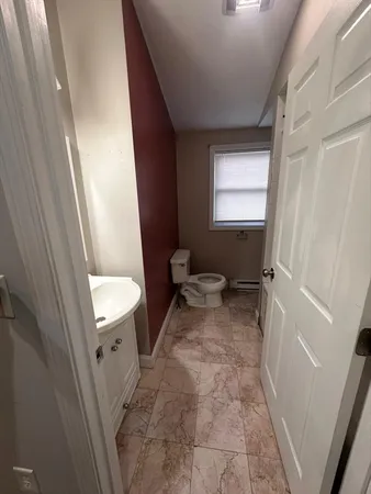 a bathroom with a bath tub and shower