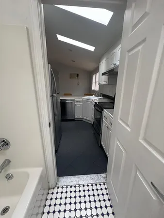 a view of street with parked cars