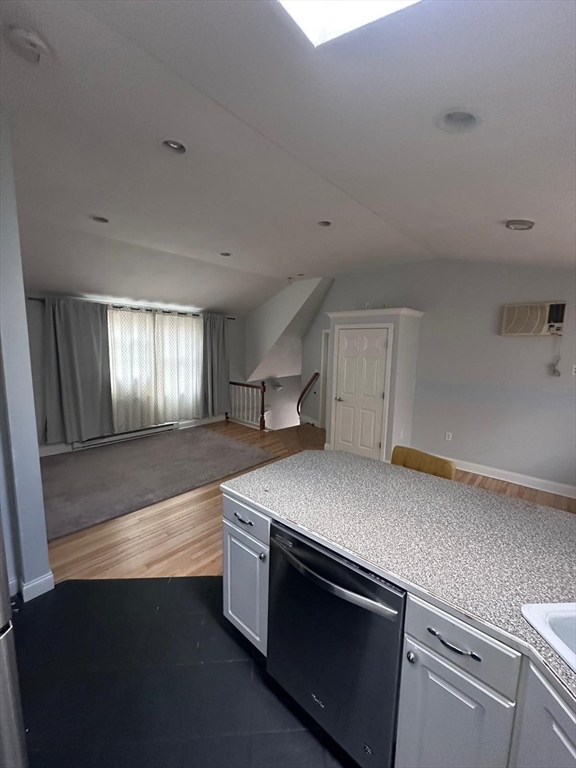 1295 Millbury Street, Unit B Worcester, MA 01607 - Photo 10 of 28 a kitchen with a stove and a sink