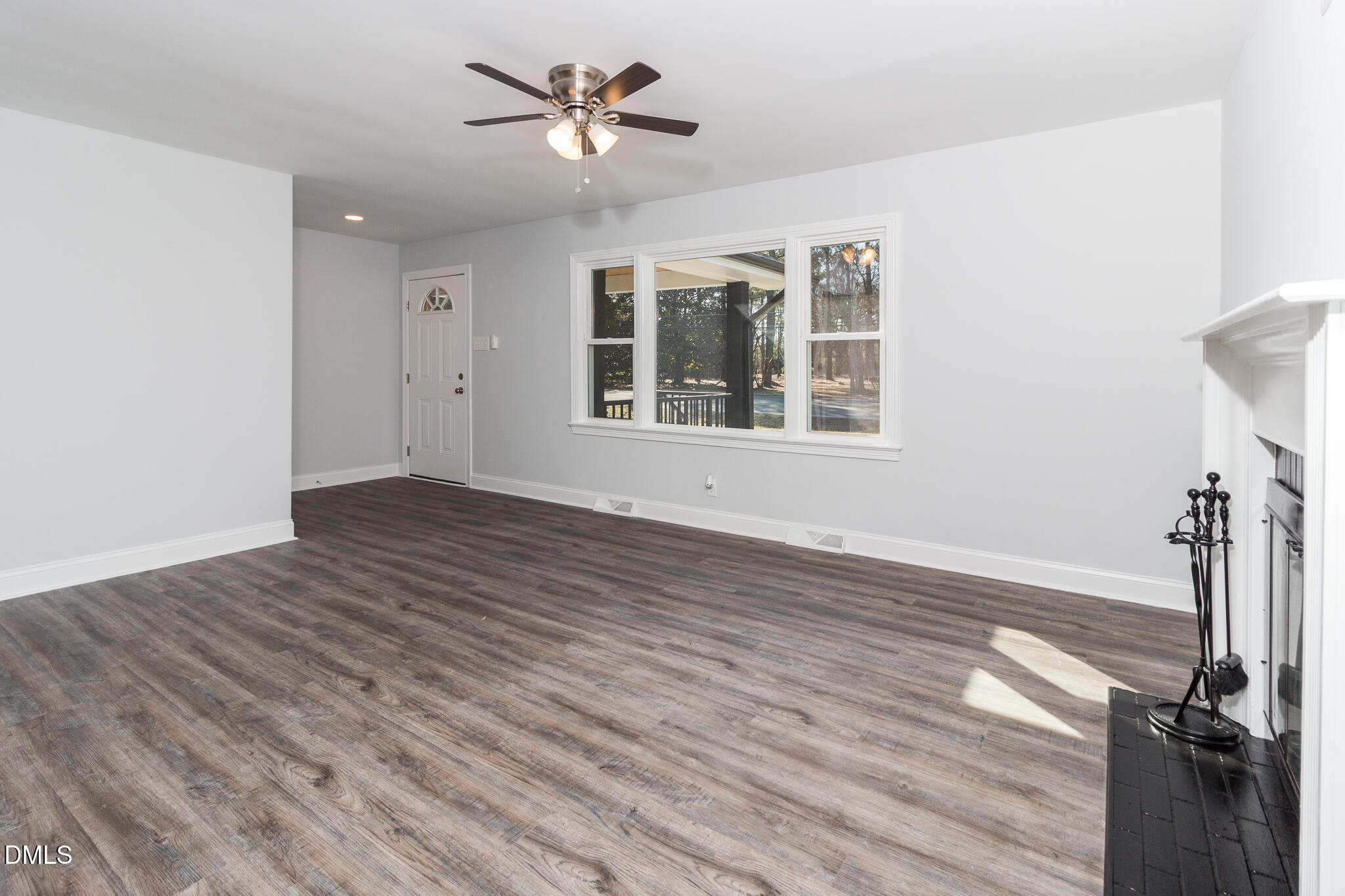 107 East New Hope Road Goldsboro, NC 27534 - Photo 13 of 33 a view of empty room with wooden floor and fan