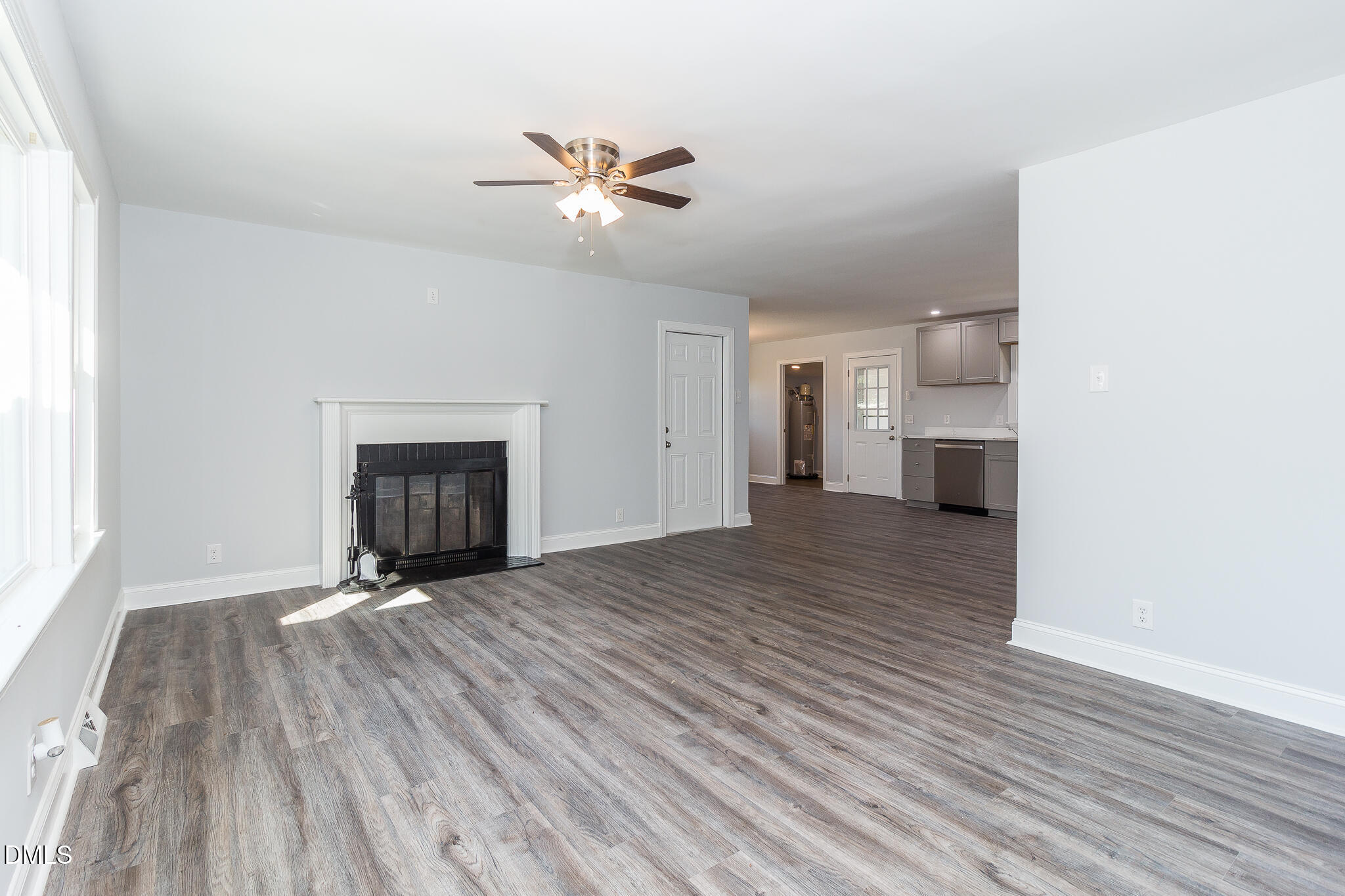 107 East New Hope Road Goldsboro, NC 27534 - Photo 14 of 33 a view of empty room with wooden floor and fireplace
