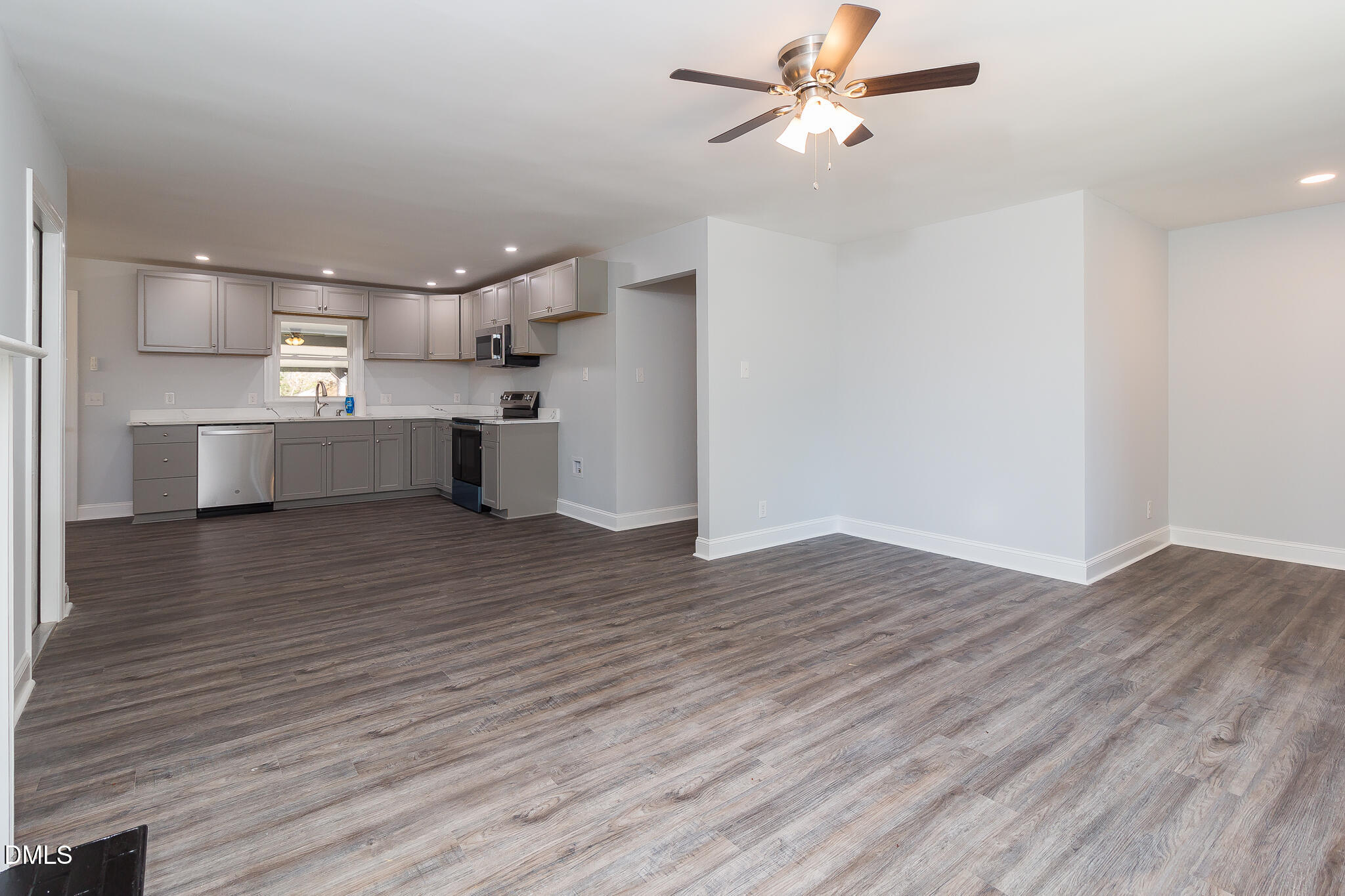107 East New Hope Road Goldsboro, NC 27534 - Photo 15 of 33 a view of a kitchen with a sink and wooden floor